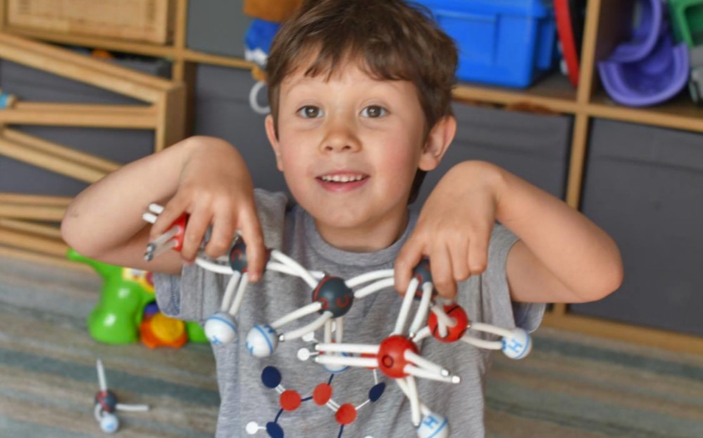 A home educated child doing a science experiment