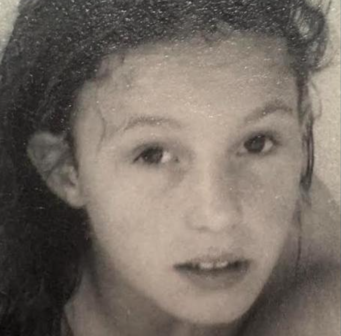 A young girl looking into the camera a research on serious case reviews by Education Otherwise