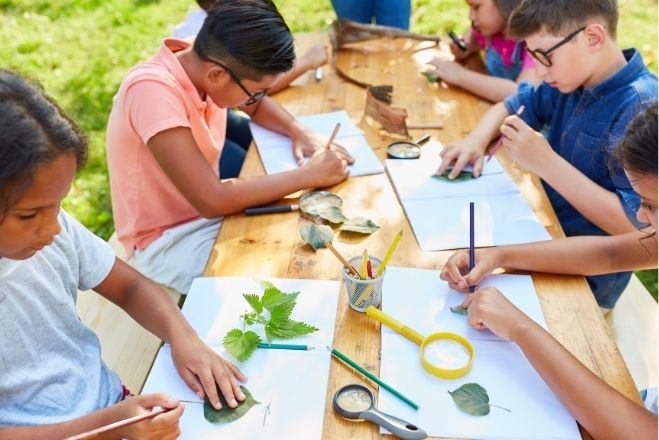 Children doing arts and crafts on a table